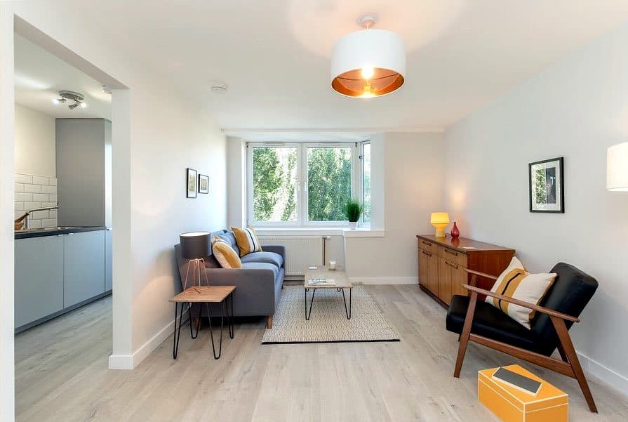 Furnished living room with mid-century furniture